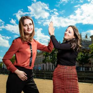 Two women high-five
